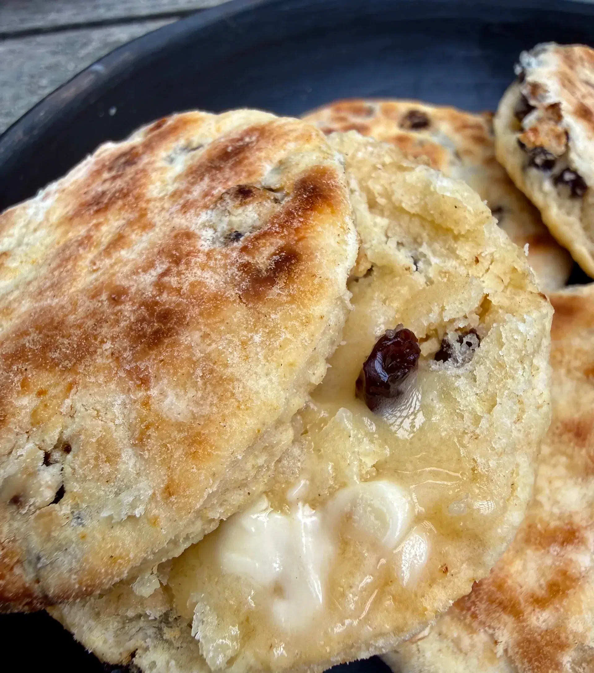 Close-up of a buttered griddle cake called a Singing Hinnie.