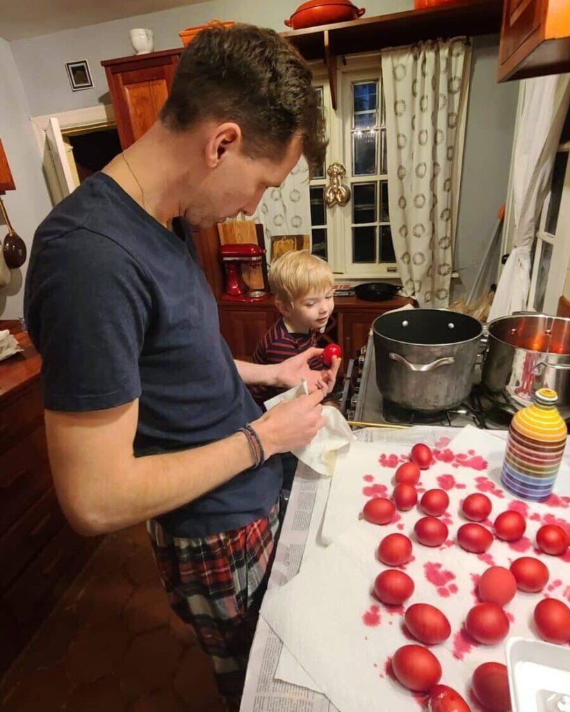 Father and son making Greek Easter Eggs